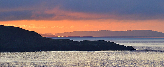 Sunrise over the Salish Sea. Photo by Alex Shapiro.